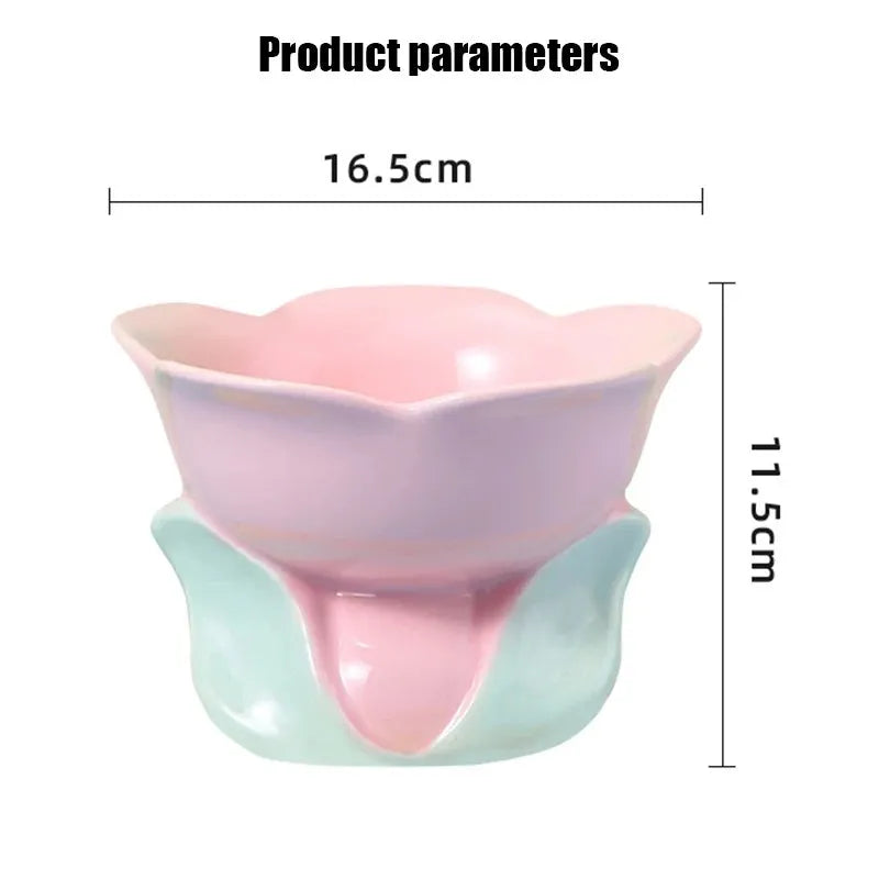 Blue floral patterned ceramic raised pet bowl with non-slip base for cats or small dogs.