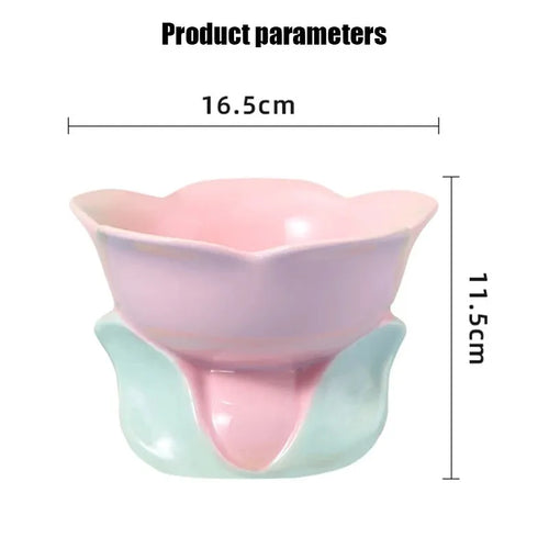Blue floral patterned ceramic raised pet bowl with non-slip base for cats or small dogs.