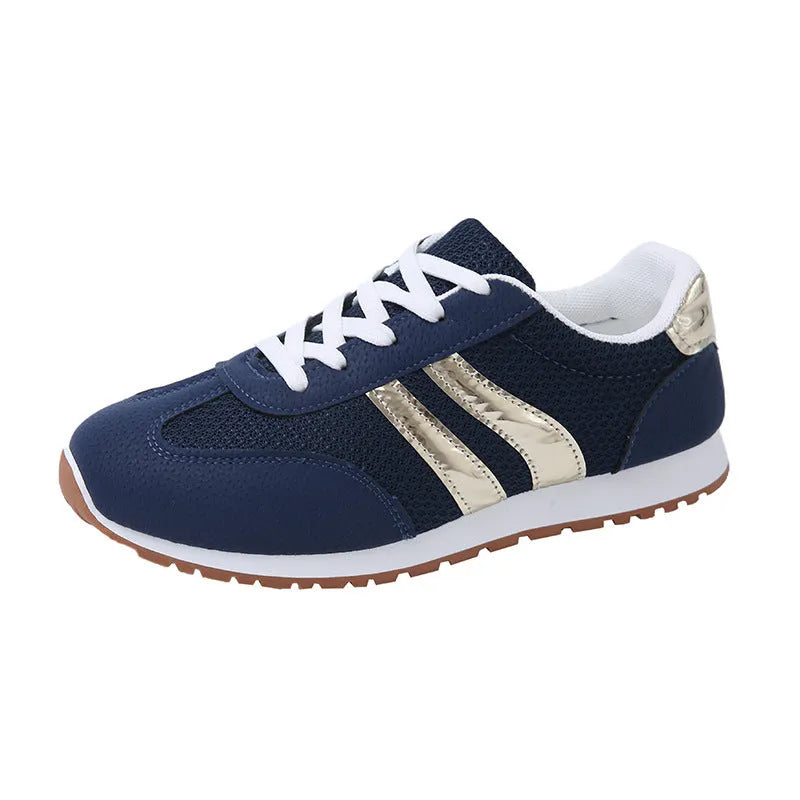 Blue women's casual sports shoes with cross shoulder straps and a lace-up front on a non-slip rubber sole.