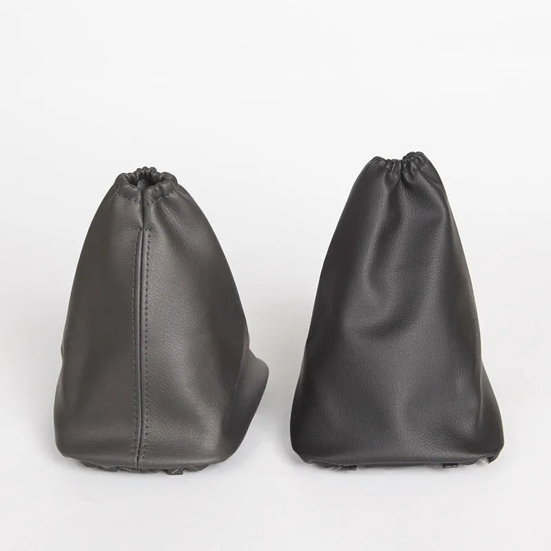 Black leather car shift lever dust cover shown with dimensions 15.2cm by 12.9cm