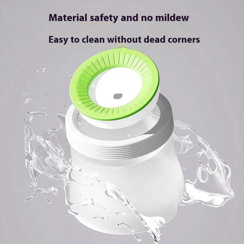 Green suspended non-spill water bowl for dogs and cats, showing the elevated bowl above the base plate