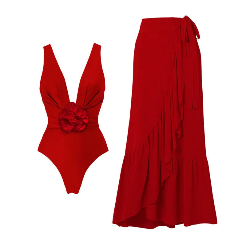 Red women's V-neck one-piece swimsuit with detachable skirt and open back design
