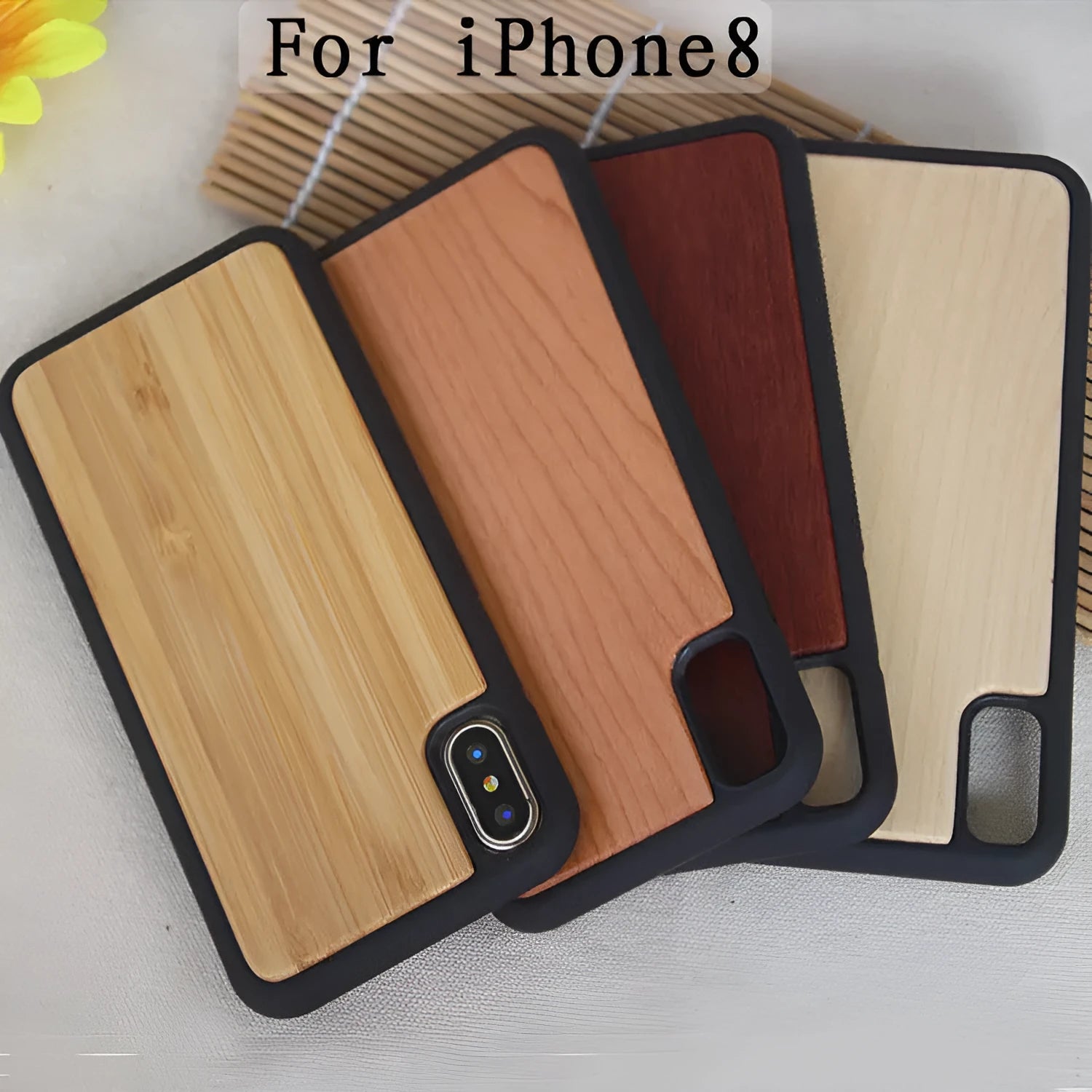 Wooden iPhone case with bamboo back and black TPU sides for multiple models.
