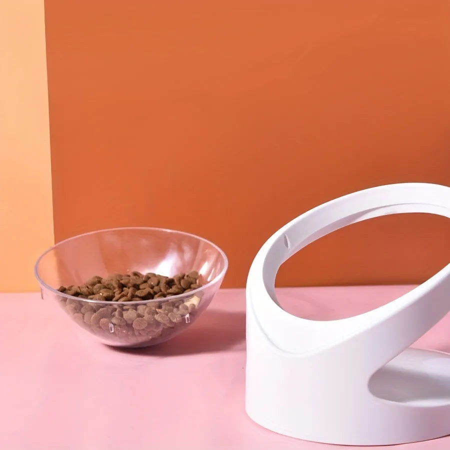 Clear plastic elevated cat food bowl with tilted design for anti-vomit feeding