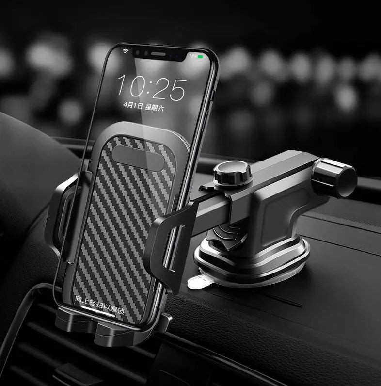 Black universal car phone holder mounted on a dashboard, showing a smartphone secured in the cradle.