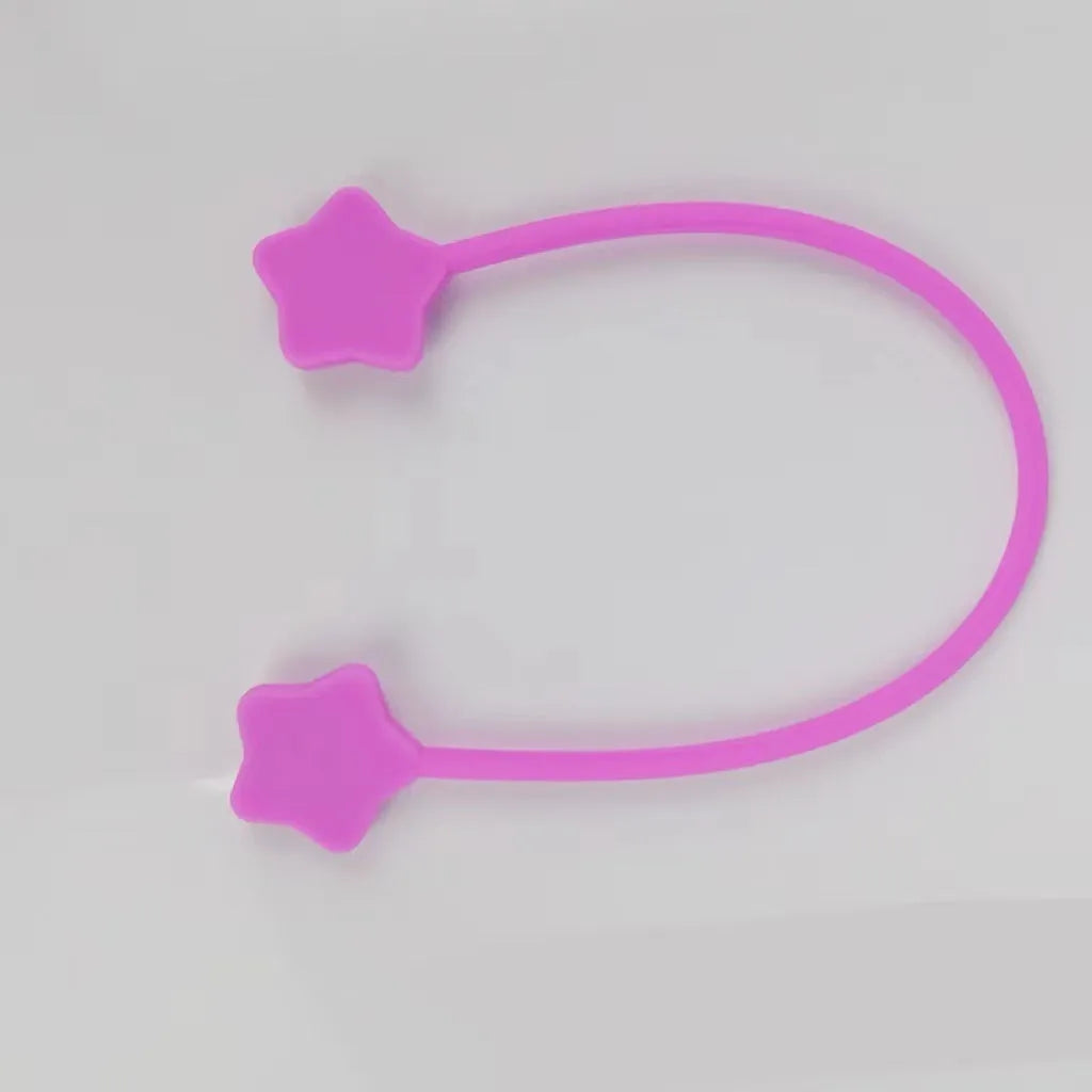 Star magnet silicone wire winder clip in various colours showing wire organisation function