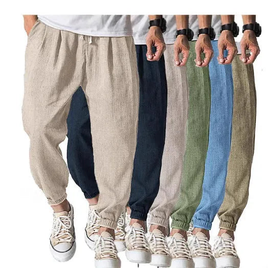 Men's casual cotton trousers with banded ankles in light green colour showing loose fit summer style