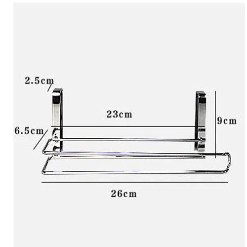 Silver stainless steel paper towel rack mounted on a kitchen cabinet door