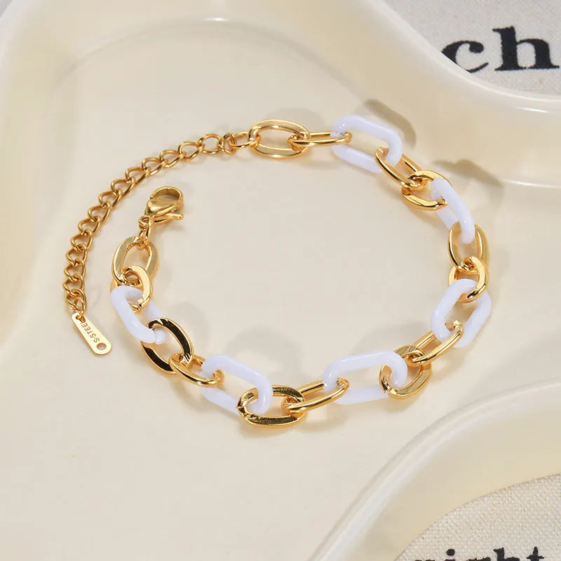 Women's stainless steel bracelet with double-layered resin heart design