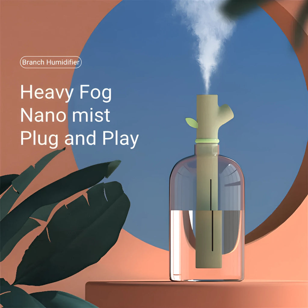 Transparent portable USB humidifier with round design and water bottle attachment