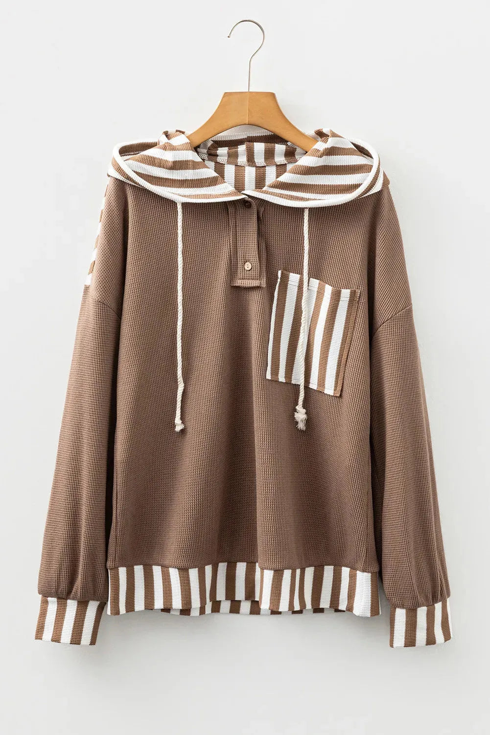 Straw yellow waffle texture striped patchwork hoodie with button neck and drawstring hood.