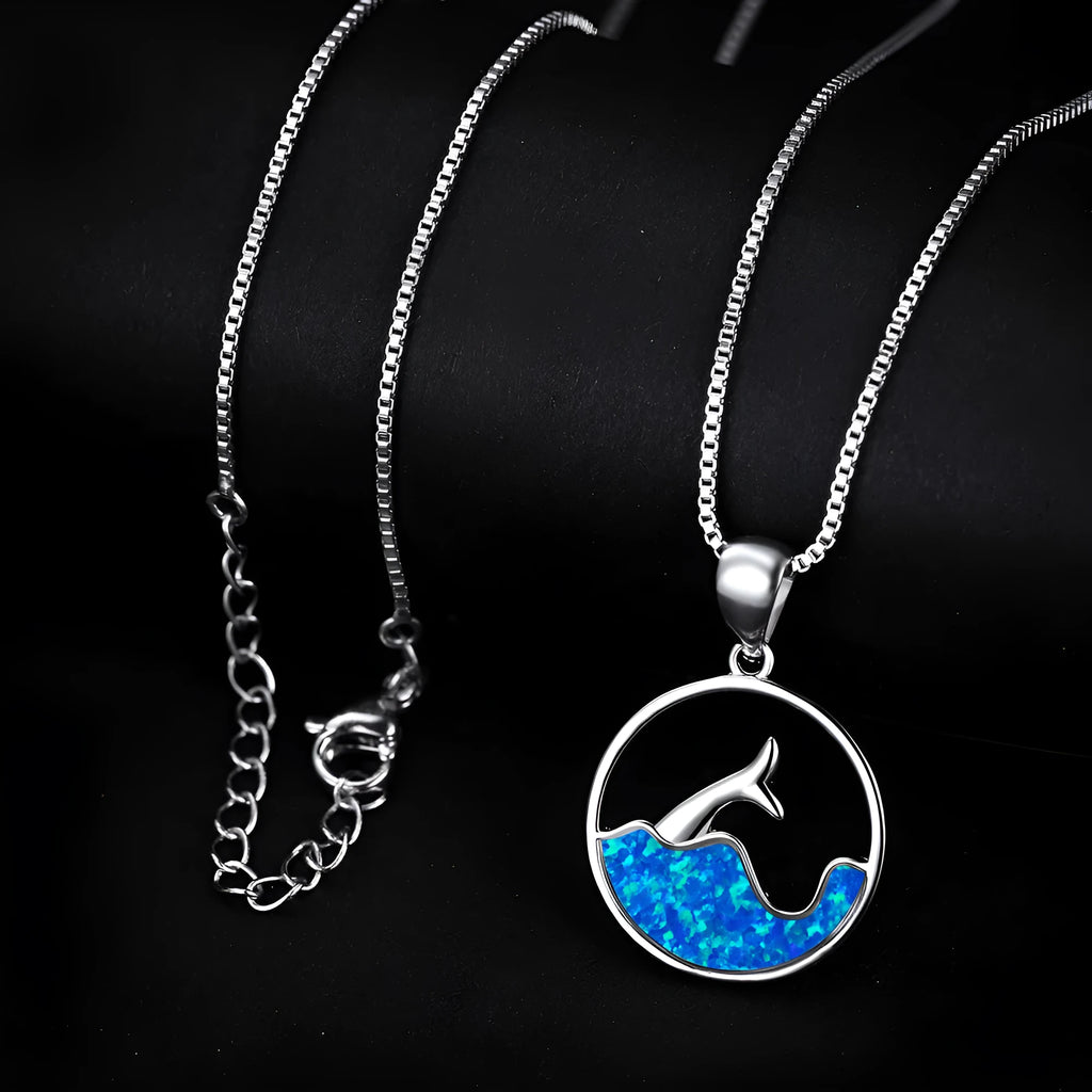 Electroplated copper fishtail necklace with round opal elements in platinum blue finish