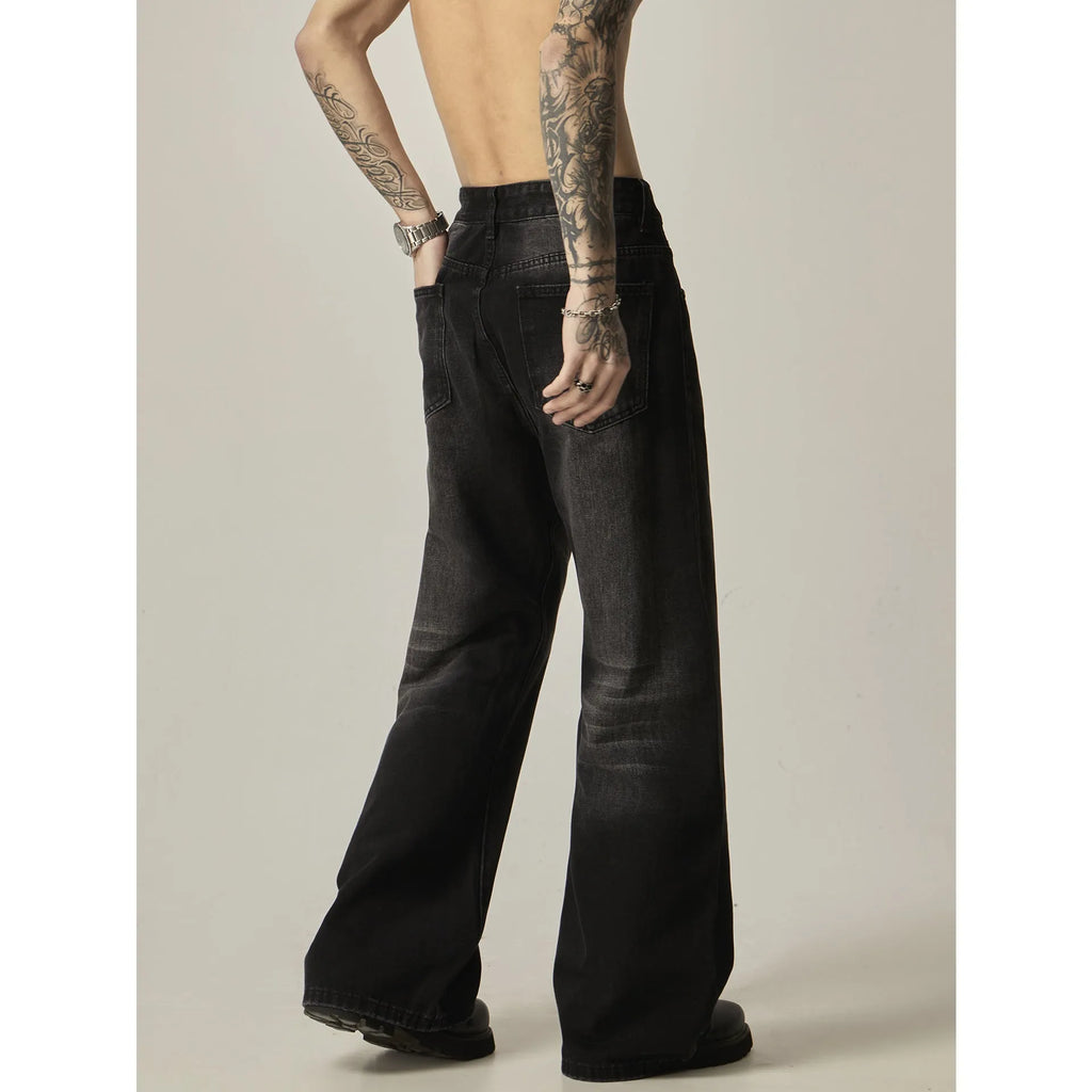 Black loose straight jeans with retro styling and zipper fly in polyester denim fabric