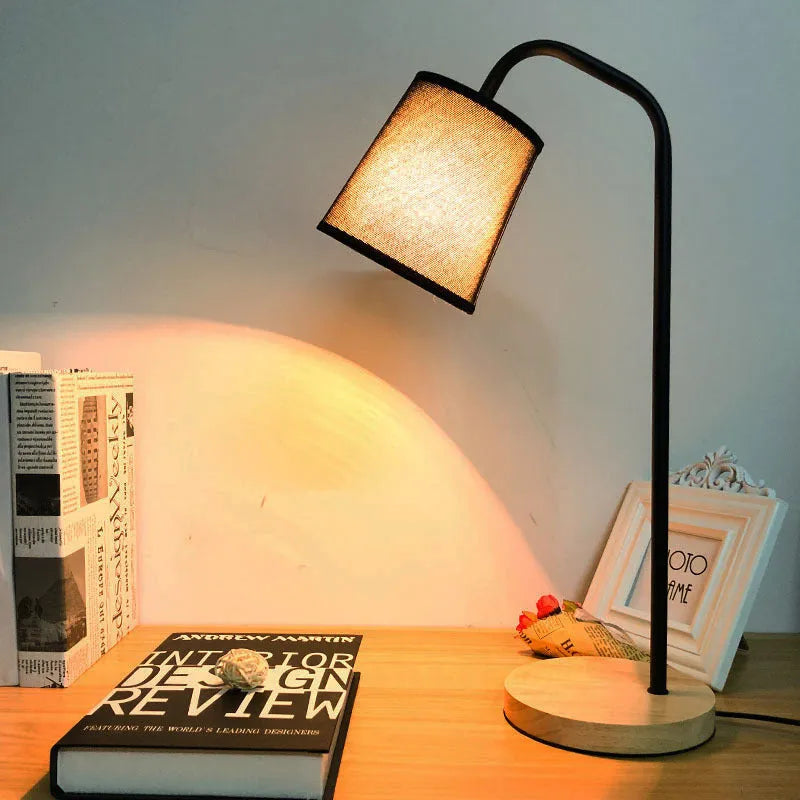 Nordic style desk lamp with dimmer switch in white finish on wooden desk