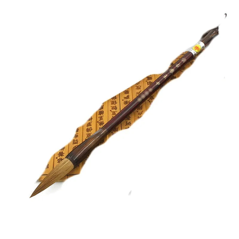 Traditional Chinese wolf hair calligraphy brush with steel rod, shown in large, medium, and small sizes.