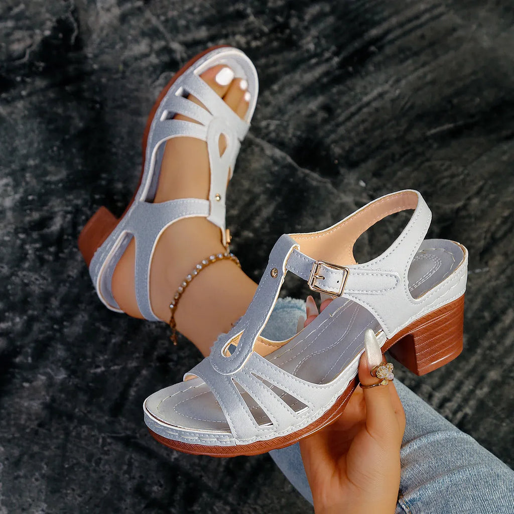 Women's peep toe wedge platform sandals in a light colour with a buckle strap