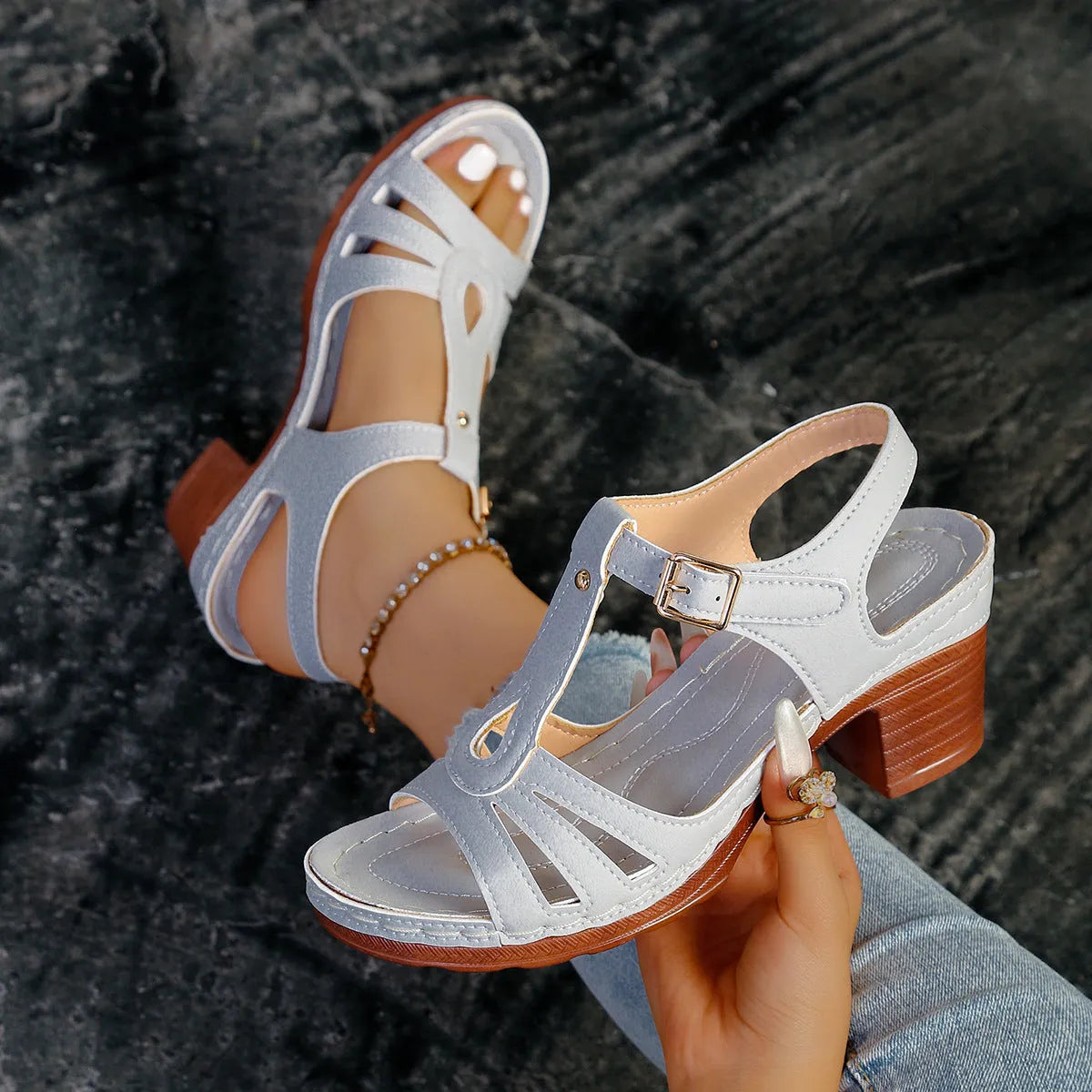 Women's peep toe wedge platform sandals in a light colour with a buckle strap