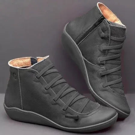 Women's casual round-toe ankle boots with a wedge heel in artificial PU, shown in multiple colour options.