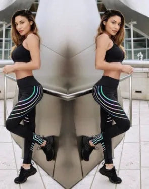 Women's black high-waist workout leggings with night-glowing prints made from milk silk fabric
