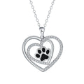 Dog paw print necklace with heart-shaped pendant on cross chain for women