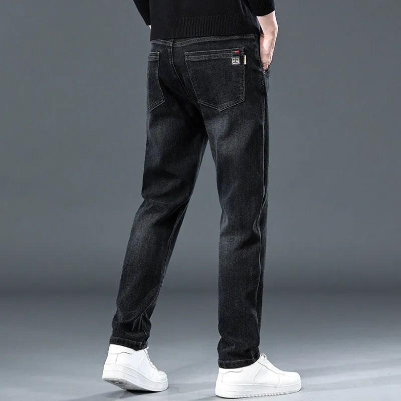 Slim straight casual trousers in black with micro elastic polyester fabric and zipper fly