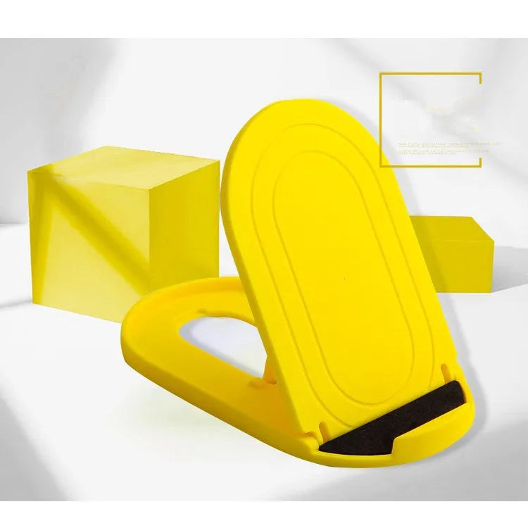 Plastic lazy bracket mobile phone stand in multiple colours on a desk