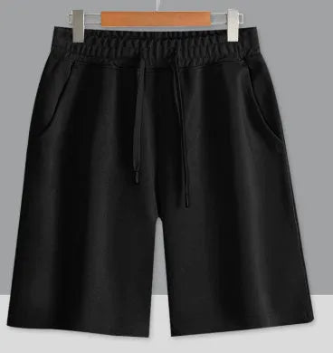 Cotton straight-leg summer shorts in light grey shown on a hanger