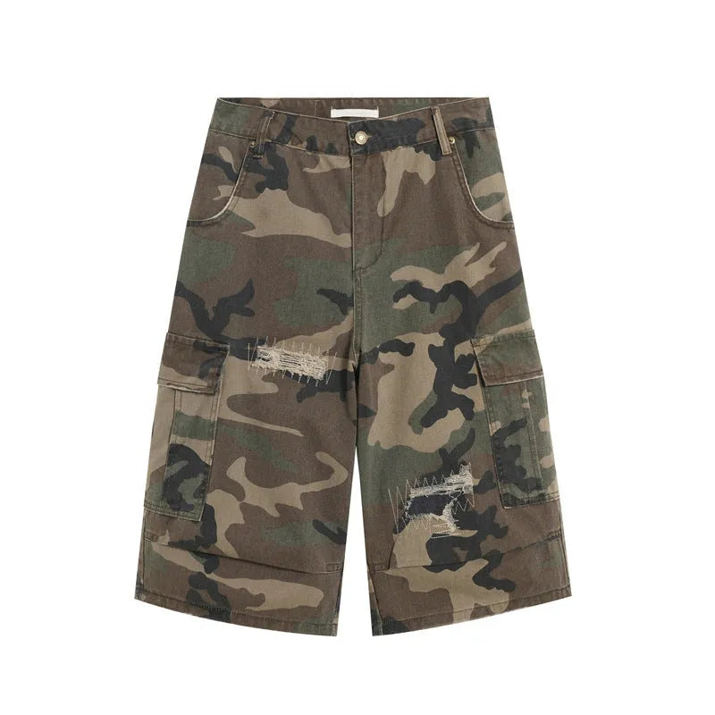 Men's camouflage cropped jeans with patch detailing and ripped accents in straight leg style
