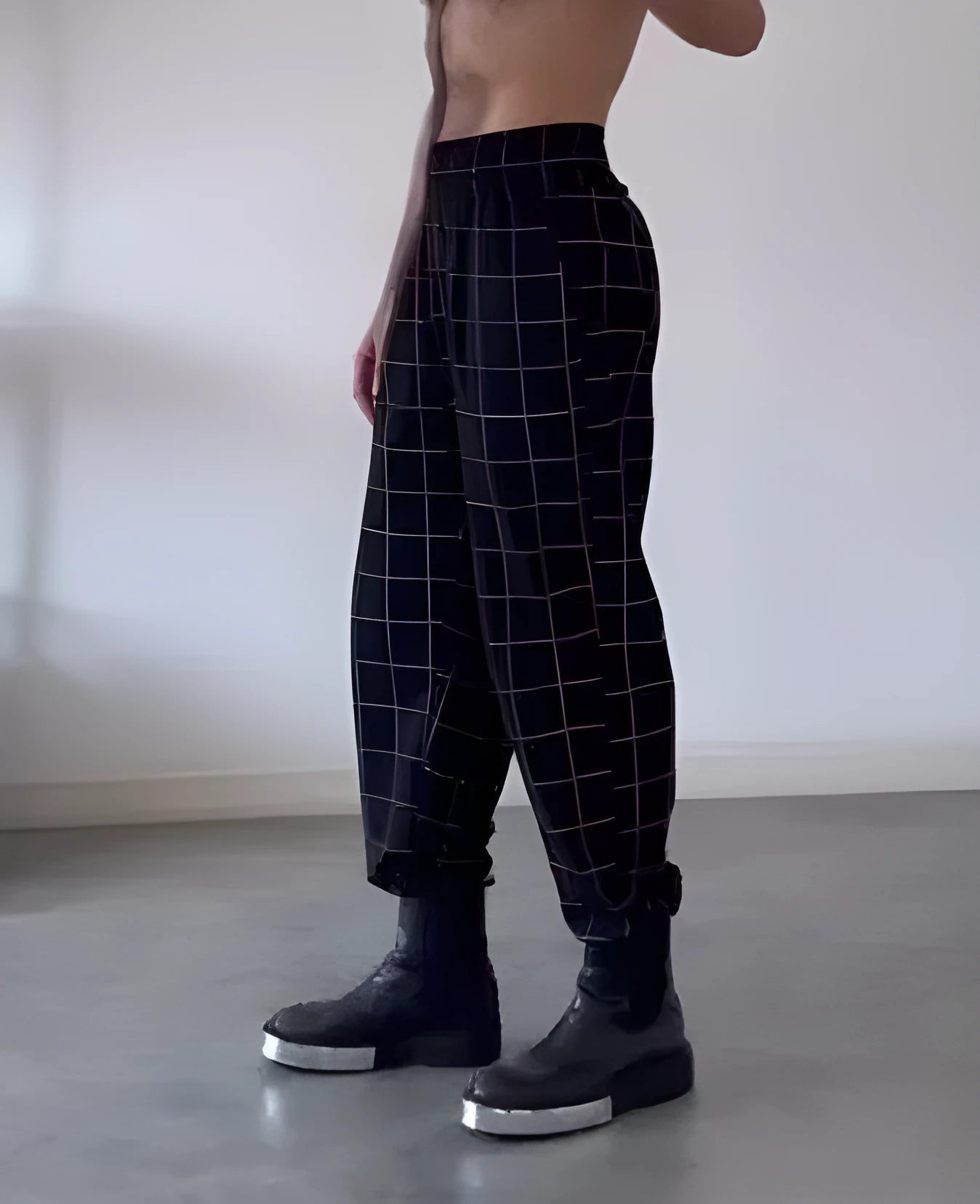 Men's plaid trousers with front apron detail in plaid pattern available in multiple sizes