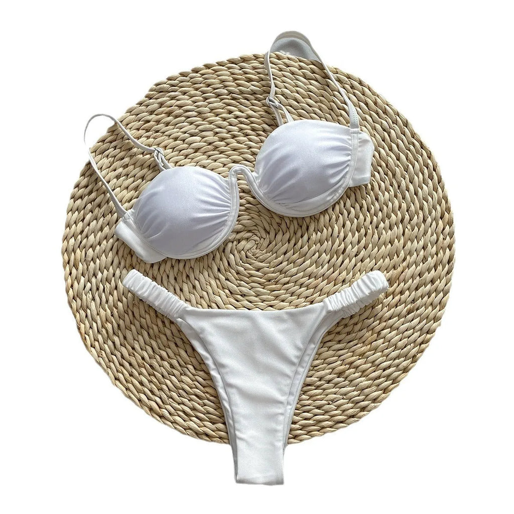 Women's black underwire bikini swimsuit set with brief bottom on a mannequin.