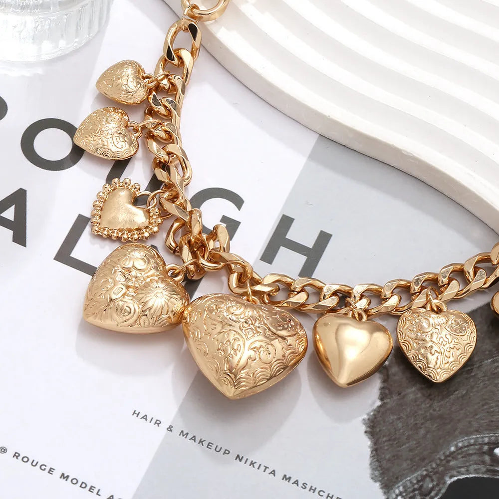 Large carved heart pendant necklace with adjustable chain in gold or white K finish