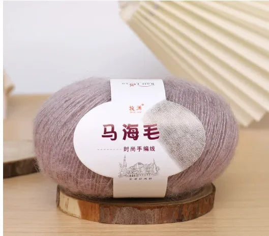 Mohair wool ball for DIY scarf knitting in assorted colours on white background