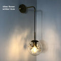 Modern glass shade wall lamp in gold or silver finish for bedside lighting