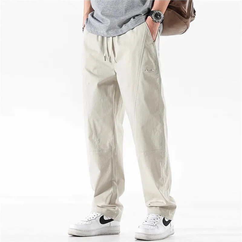 Women's milky white cotton wide-leg casual trousers with an antibacterial feature on a hanger.