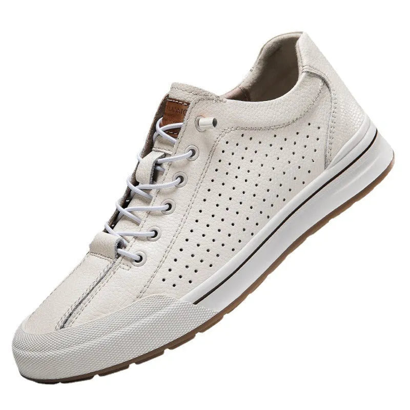 Men's white matte leather casual shoes with breathable hollow-out design and flat heel.