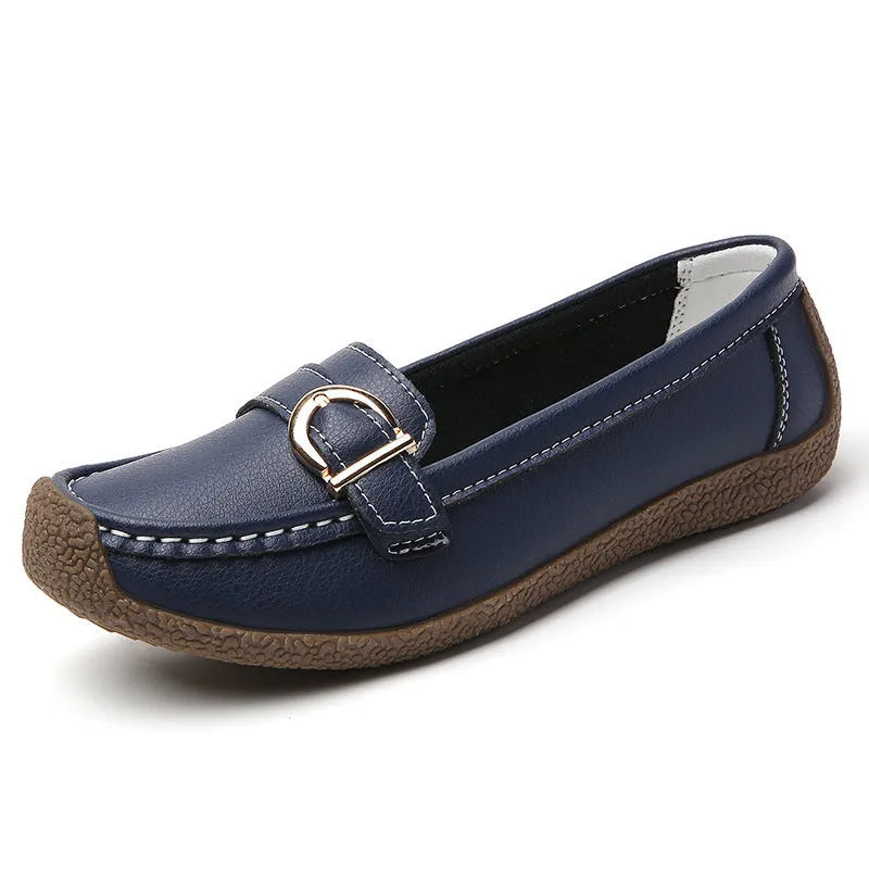 Women's casual flat loafers in artificial PU leather with a rounded toe and beef tendon sole.