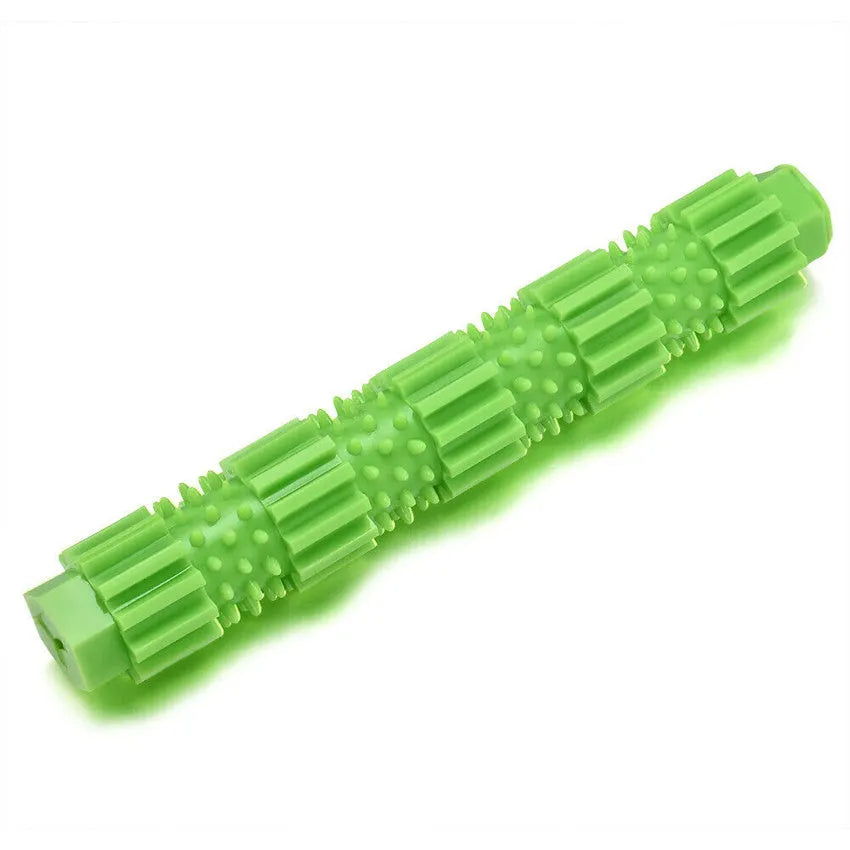 Green natural rubber dog chew toy with textured surface and treat-dispensing hole.