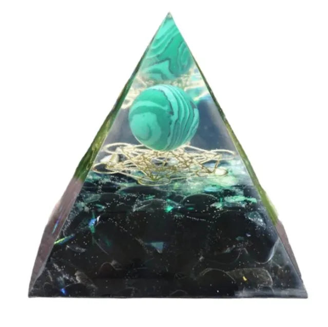 Clear epoxy resin pyramid ornament with embedded coloured crystal gravel inside, measuring 6cm.