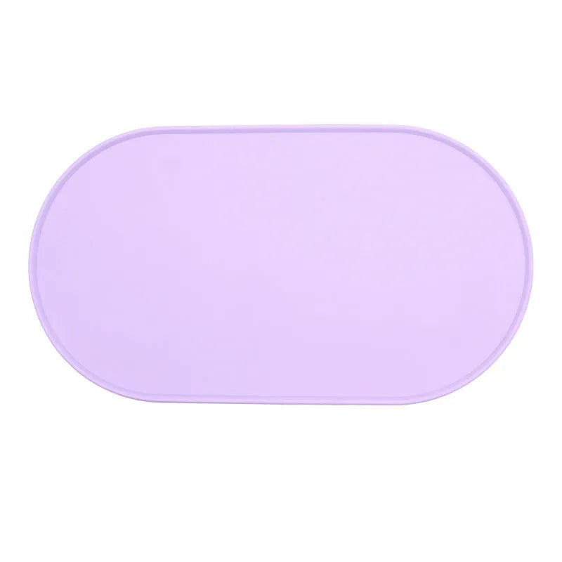Silicone waterproof cat feeding placemat in beige colour on a wooden floor