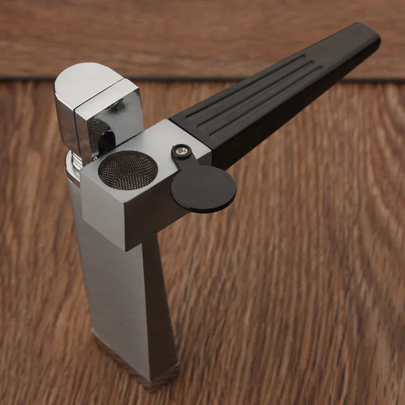 Silver foldable metal pipe lighter shown open, revealing the lighter mechanism and a small stash compartment.