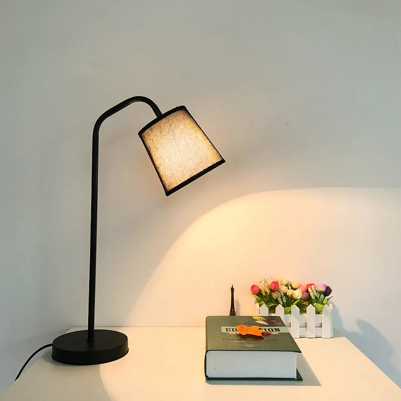 Nordic style desk lamp with dimmer switch in white finish on wooden desk