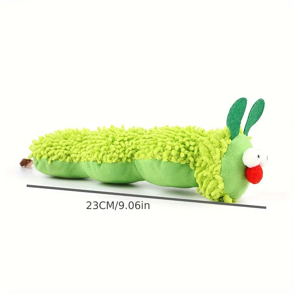 Green interactive plush cat toy pillow measuring 24x11x5cm on a floor