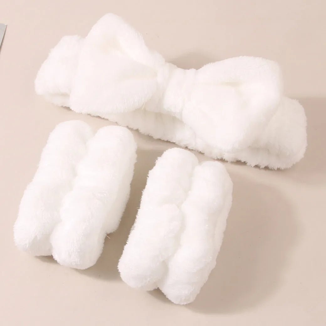 Facial brush and coral fleece hair band set in purple colour with plastic handle and nylon bristles