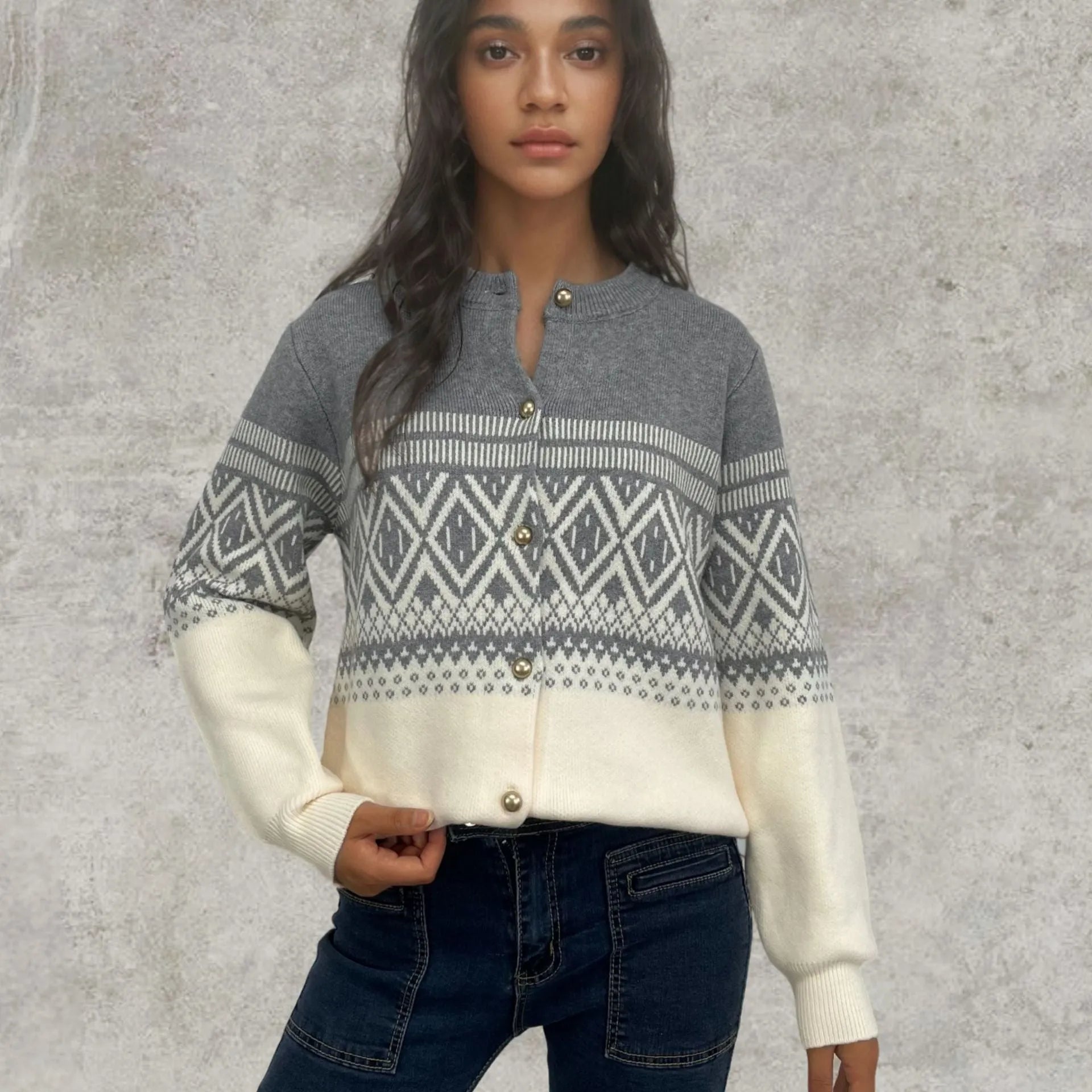 Women's red alpaca wool cardigan with diamond knit pattern and contrast colour long sleeves.