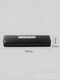 Small black automatic vacuum sealer machine for food preservation and item protection