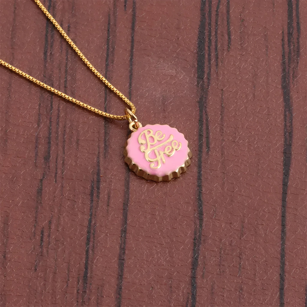 Copper bottle cap pendant necklace with gold plating on a 40cm box chain.
