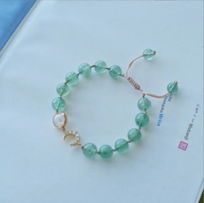 Handmade strawberry quartz crystal bracelet with hetian jade peach blossom elements in five style variations