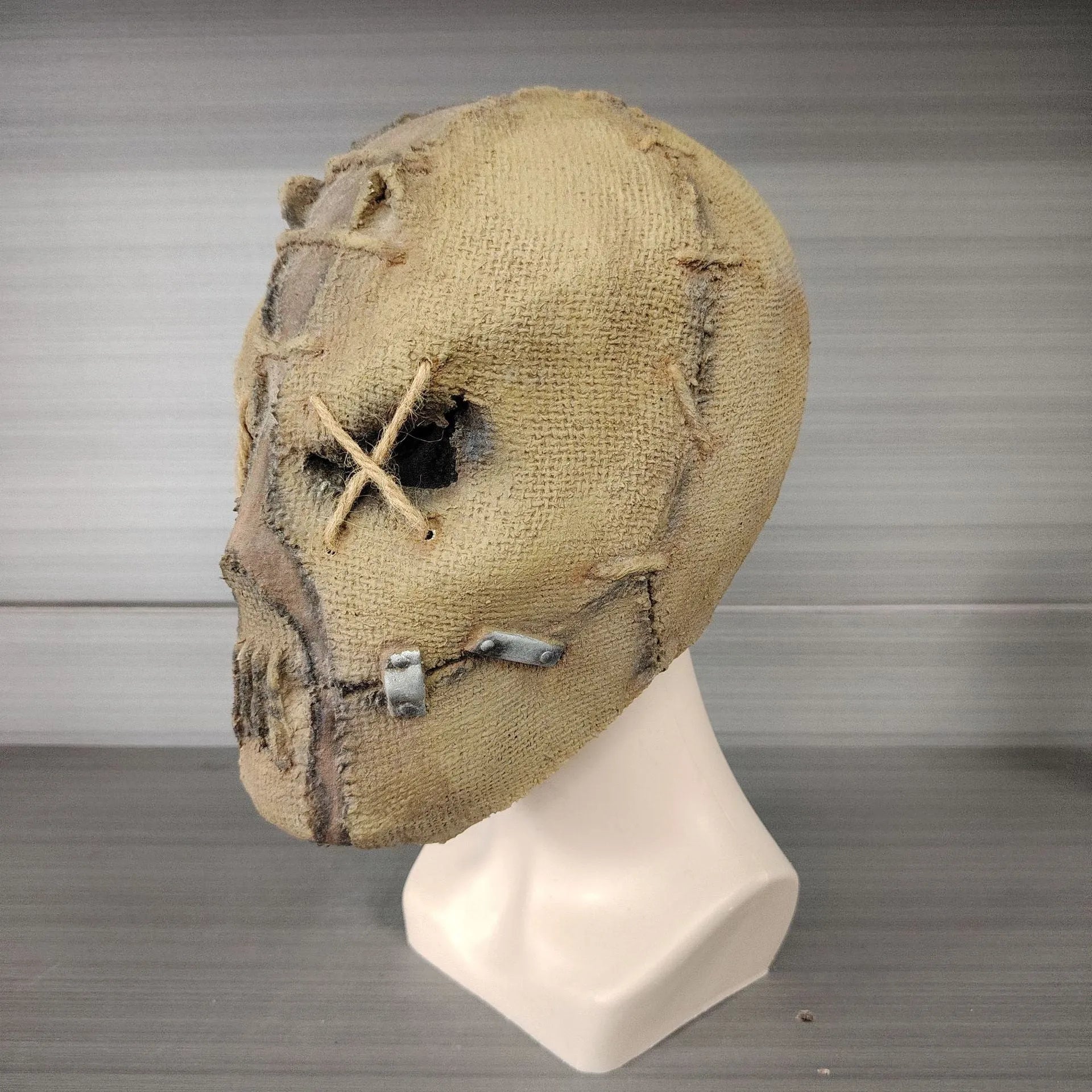 Scarred skull latex mask for adult Halloween costumes showing detailed scar texture