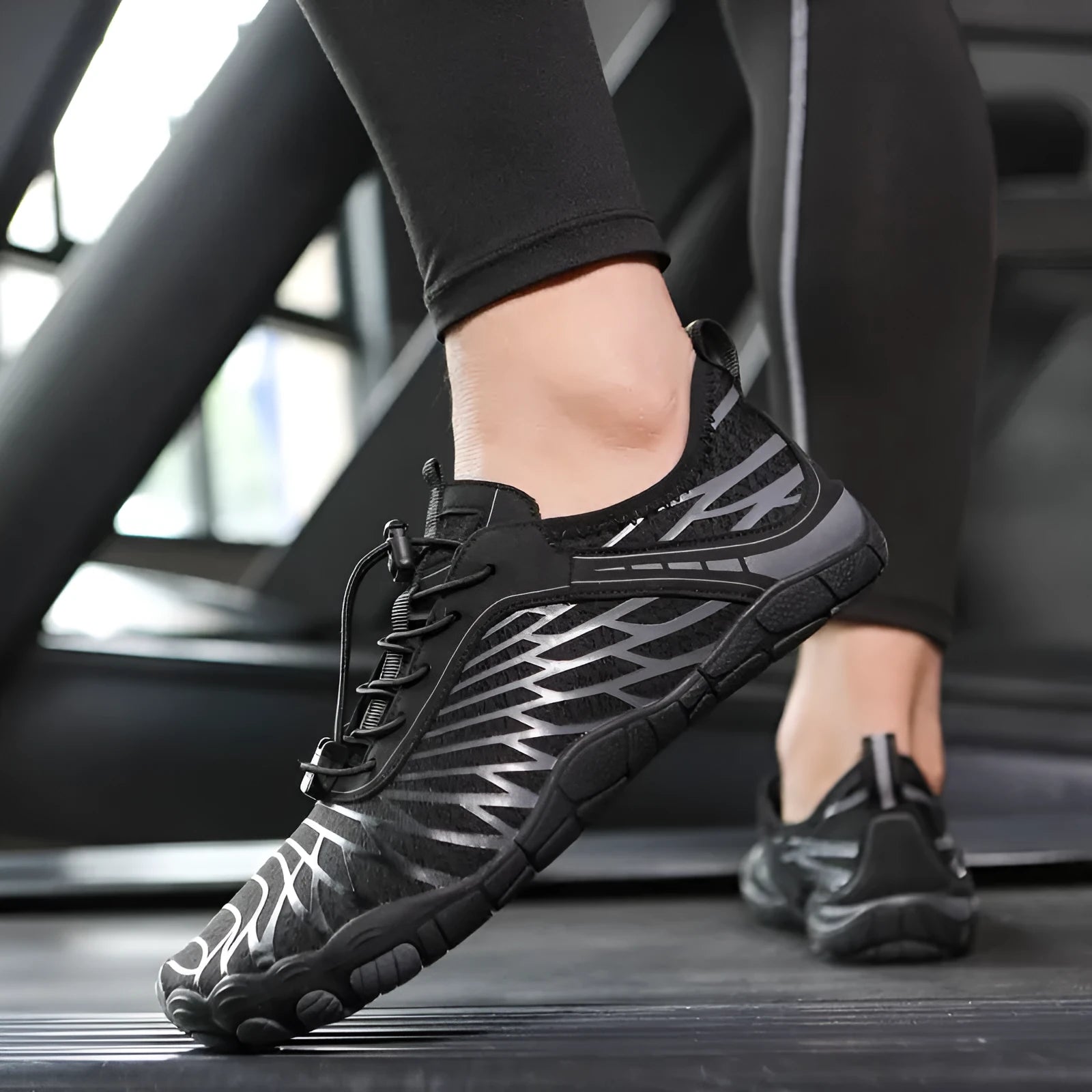Men's white and black lace-up casual outdoor shoes with rubber sole on a plain background.
