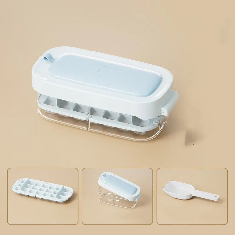 Yellow high-capacity ice cube tray with grid design and a storage slot for an ice shovel.